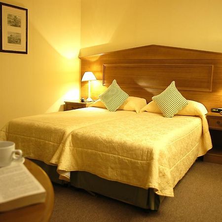 Astons Apartments Londen Kamer foto