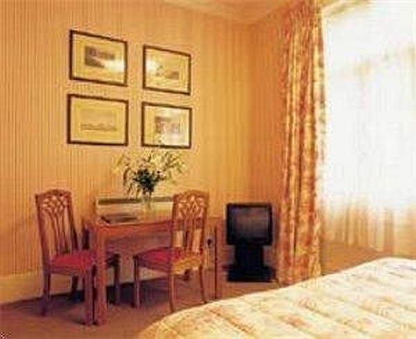 Astons Apartments Londen Kamer foto