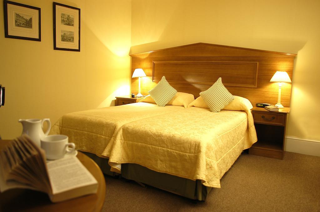 Astons Apartments Londen Kamer foto