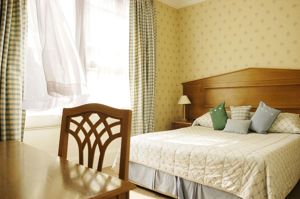 Astons Apartments Londen Kamer foto