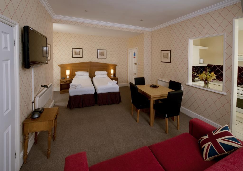 Astons Apartments Londen Kamer foto