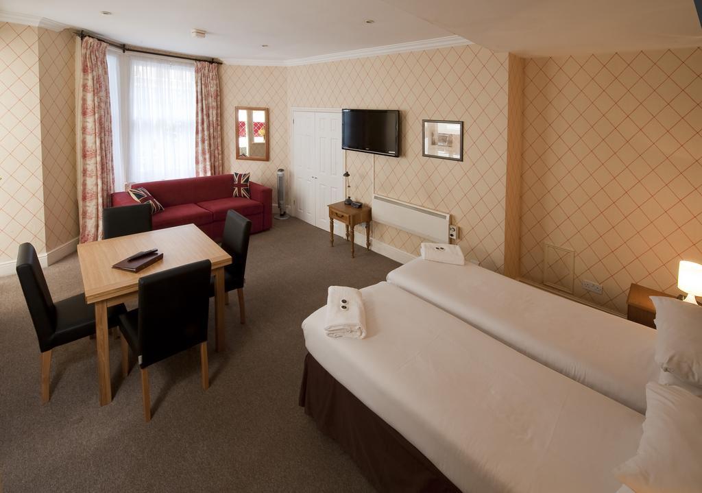Astons Apartments Londen Kamer foto